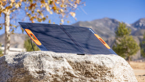 Sasquatch 100F Portable Folding Solar Panel on Rock Close Up - Onsite Oak Glen Ca