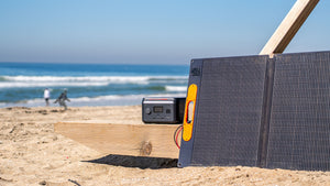 Sasquatch Outdoor 600W Portable Power Station and 100F Solar Panel on Life Guard Tower Base at Beach
