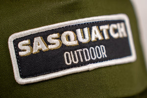 Sasquatch Outdoor Hat Design 2 Baseball Snapback Green Front Patch Closeup