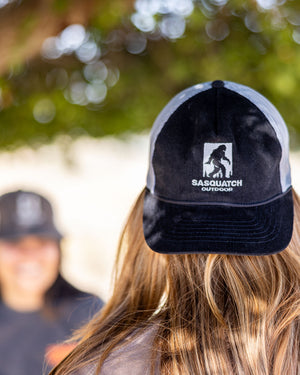 Sasquatch Outdoor Black Hat Backwards on Skylar Onsite Lifestyle