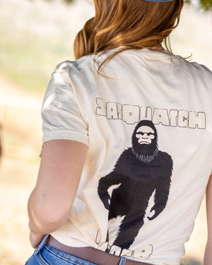 Sasquatch Outdoor Ivory Silhouette Shirt Back Onsite Lifestyle Photo Underneath Tree with Tacy